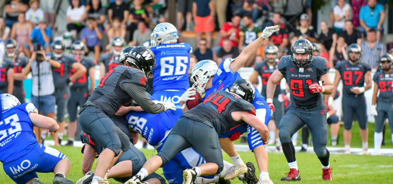 Wildcats gewinnen Defense-Schlacht und spenden